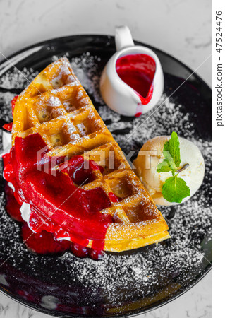 Waffles with strawberry and Vanilla Ice Cream Waffles with strawberry and Vanilla Ice Cream 47524476