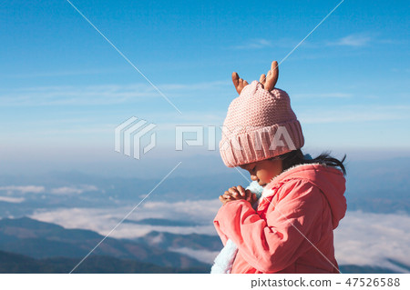 child girl making folded hands in prayer child girl making folded hands in prayer 47526588