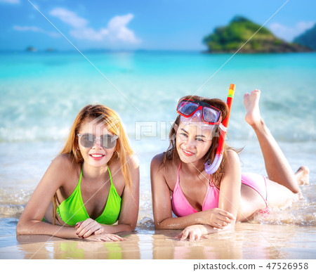 Lady sleep and relax on the beach in Thailand  47526958