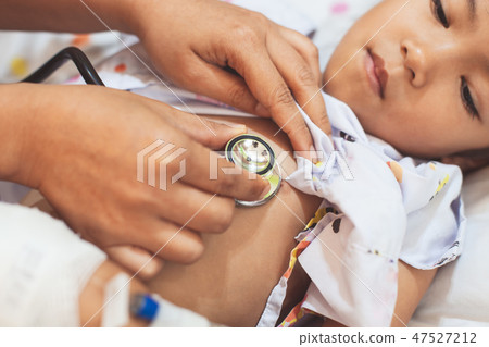 Doctor examining child and listen lung and heart Doctor examining child and listen lung and heart 47527212