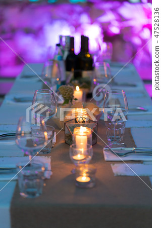 wedding table served in a rustic style at dusk 47528136