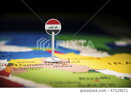Iraqi marked with a flag on the map Iraqi marked with a flag on the map 47529671