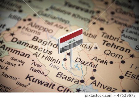 Iraqi marked with a flag on the map Iraqi marked with a flag on the map 47529672