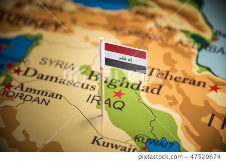 Iraqi marked with a flag on the map Iraqi marked with a flag on the map 47529674