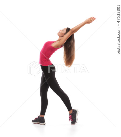 fitness woman doing stretching workout 47532803