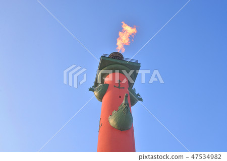 Rostral column on blue sky. 47534982