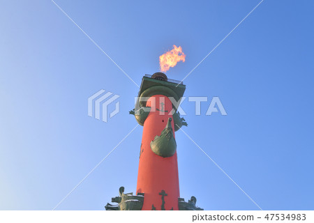Rostral column on blue sky. 47534983