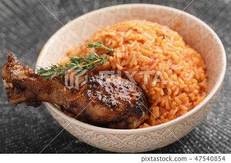 Nigerian Jollof Rice with chicken thigh 47540854