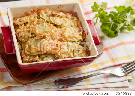 Potatoes a la dauphinoise 47540888