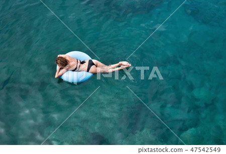 Girl relax on the sea. Girl relax on the sea. 47542549