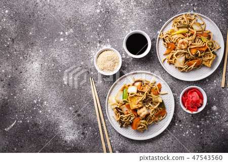 Asian noodles with shrimps and vegetables Asian noodles with shrimps and vegetables 47543560