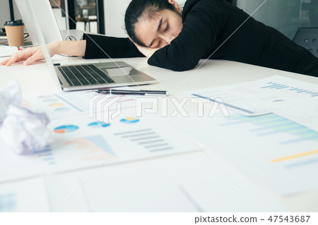 Tired overworked businesswoman Tired overworked businesswoman 47543687