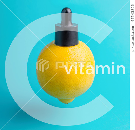 Vitamin C. lemon with cap and pipette. Essential oil, serum, or essential oil 47543896
