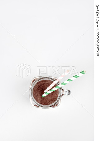 Sports nutrition with chocolate protein shake, top view. Copy space 47543940