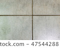 Gray tiles background 47544288