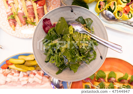 Festive table with bright snacks 47544947