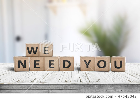 We need you sign on a white table in a bright room 47545042