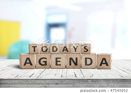 Today's agenda sign on a wooden desk Today's agenda sign on a wooden desk 47545052