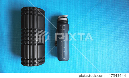 Foam Roller Gym Fitness Equipment Blue background self Myofascial Release 47545644