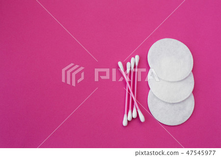 top view on pink cotton buds with white heads and top view on pink cotton buds with white heads and 47545977
