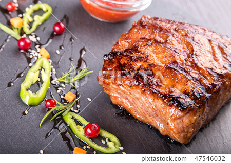 Steak on slate blackboard Steak on slate blackboard 47546032