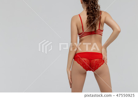 Beautiful sexy slim woman on white background 47550925
