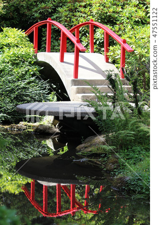 Red bridge in the Japanese garden 47551122