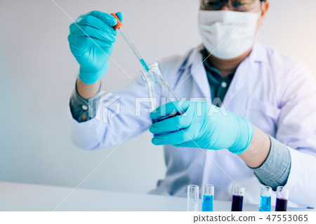 Chemist scientist conducts experiments 47553065