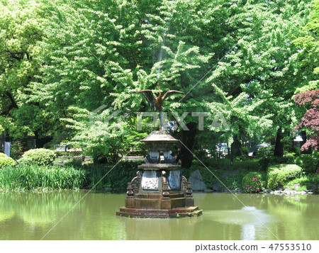 Crane fountain in cloud form pond at Hibiya park 47553510