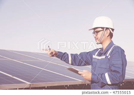 electrician inspect and checking solar equipment 47555015