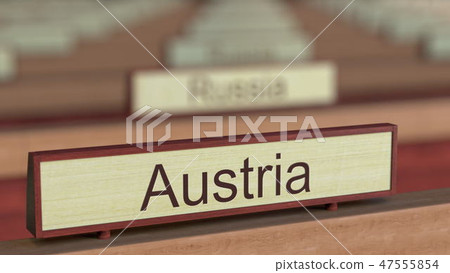 Austria name sign among different countries plaques at international organization. 3D rendering 47555854