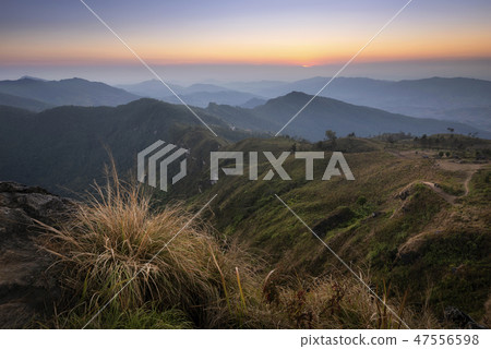 Sunset view of the peak of mountain at Phu chi fa 47556598