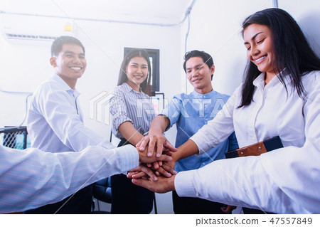 business meeting concept, business team join hands after working business meeting concept, business team join hands after working 47557849