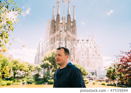 Barcelona, Spain. Portrait Of Caucasus Man On Background Basilica And Expiatory Church Of Holy 47559894