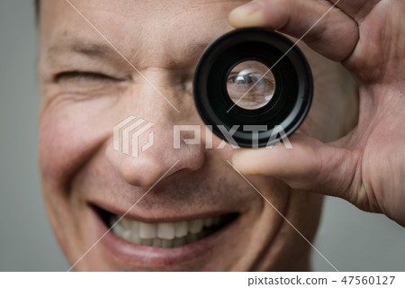 The man with a lens. 47560127
