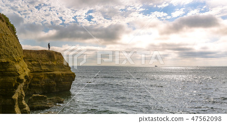 Man on a bluff overlooking ocean in La Jolla Man on a bluff overlooking ocean in La Jolla 47562098