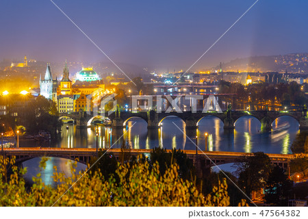 Prague bridges over Vltava River in the evening, Praha, Czech Republic Prague bridges over Vltava River in the evening, Praha, Czech Republic 47564382