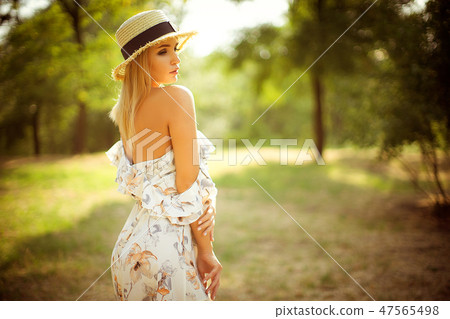 beautiful young woman outdoor on a summer day 47565498