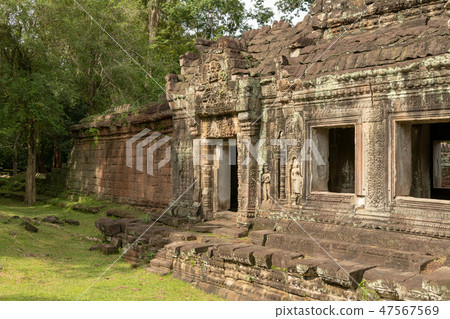 Windows and doorway in stone temple wall Windows and doorway in stone temple wall 47567569