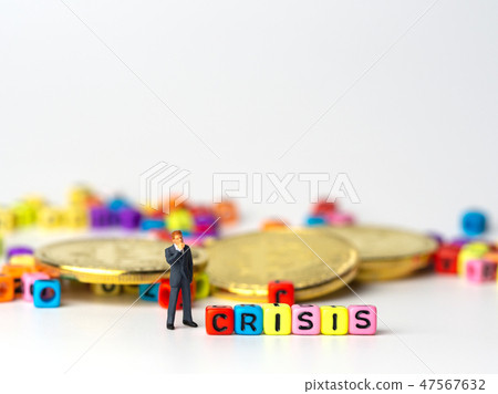 miniature figure businessman in dark blue suit 47567632