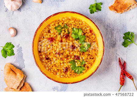 Lentil soup (Masoor Dal or Dal Tadka Curry) Lentil soup (Masoor Dal or Dal Tadka Curry) 47568722