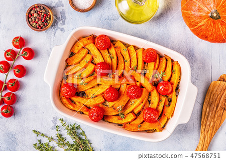Pumpkin casserole with meat, rice, tomatoes. 47568751