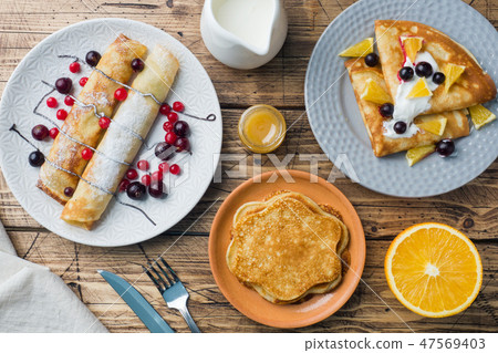 Different types of pancakes with berries pancake,  47569403