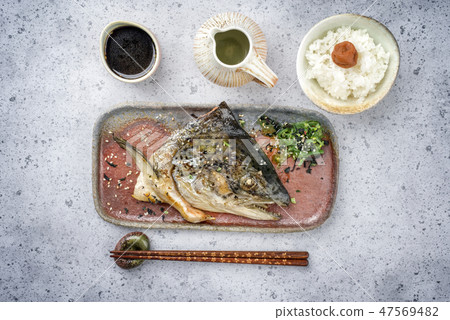 Japanese Kama Yaki broiled salmon fish head Japanese Kama Yaki broiled salmon fish head 47569482