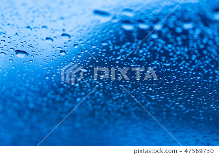 water drops on blue background 47569730