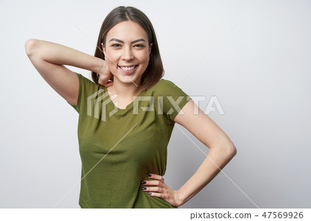 Happy playful brunette woman looking at copy space 47569926