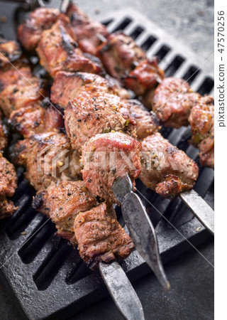 Traditional Russian shashlik on a barbecue skewer  47570256