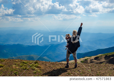 Woman with raised arm. Translation of the text on the jacket Woman with raised arm. Translation of the text on the jacket 47571863