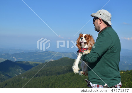 Man and dog in a landscape Man and dog in a landscape 47571877