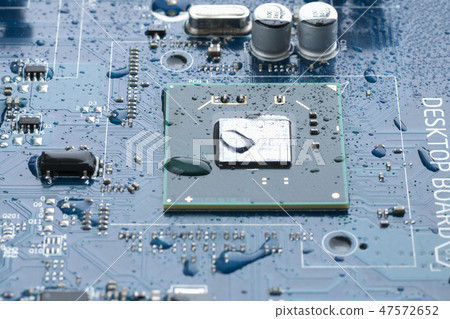 Electrical circuit mother board with water drops 47572652